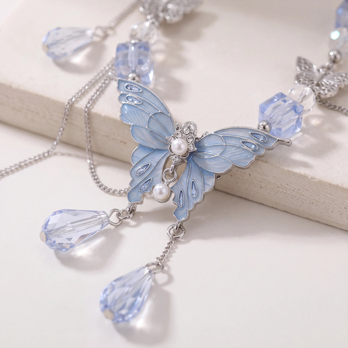 Blue Butterfly Crystal Cascade Necklace