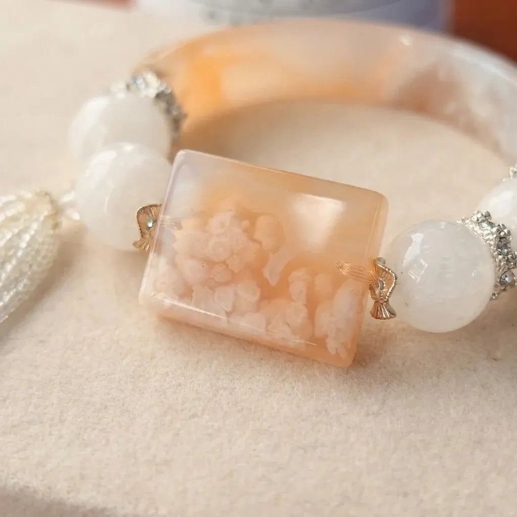 White Quartz & Peach Sakura Agate Tassel Bangle – 6¾"