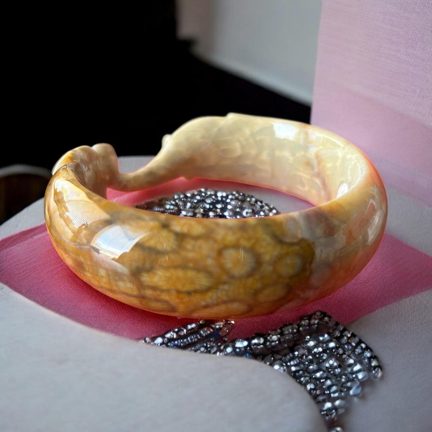 Hand-Carved Coral Jade Elephant Bangle: Symbol of Wisdom - 55.5mm AA-10002